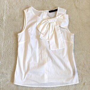 White Sleeveless Top with Bow Detail